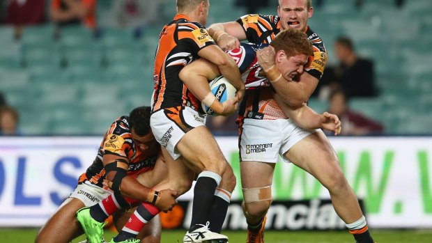 Workhorse: Dylan Napa takes the Tigers defence on single-handedly.