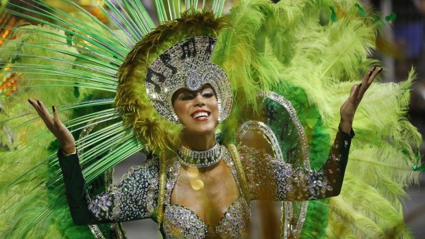 A dancer in an elaborate costume joins the carnival parade in Sao Paulo.