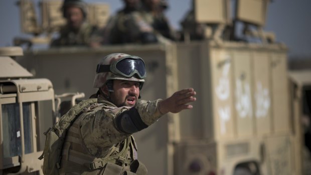 Afghan security forces on patrol in Helmand province.