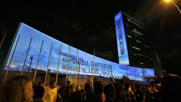 Messages in support of action to combat climate change are projected onto the side of the UN building in New York, ahead of the international summit that begins this month.