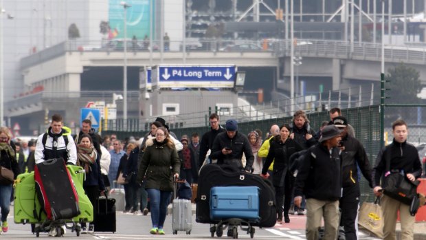 Passengers are evacuated from Zaventem Brussels International Airport.