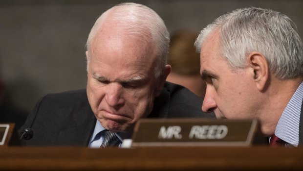 John McCain, left, has warned that most congressional Republicans are "basic conservatives" in their principles.