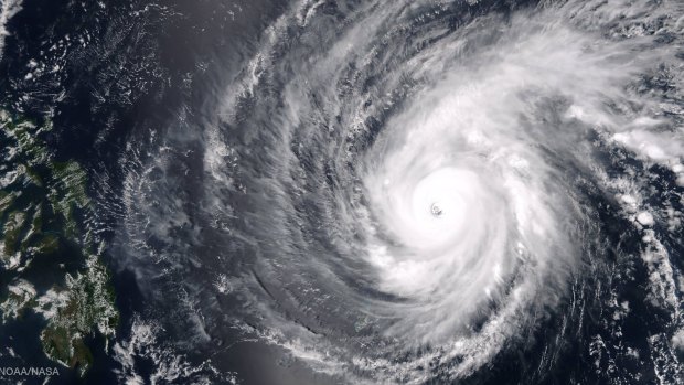 Super Typhoon Maysak is seen tracking west-northwestward through the western Pacific Ocean, in this image taken by the Suomi NPP satellite's VIIRS instrument.
