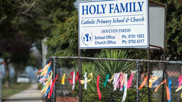 Ribbons on the fence of the Holy Family school in Doveton.