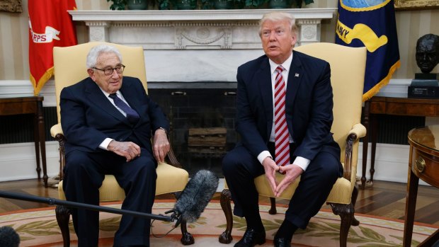 President Donald Trump meets with Dr. Henry Kissinger, former Secretary of State and National Security Advisor under President Richard Nixon, in the Oval Office on Wednesday.