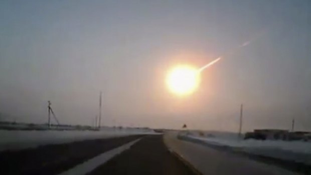 Screen grab from a dashboard camera video on February 15, 2013, shows a 20 metre asteroid breaking up over Chelyabinsk, Russia.