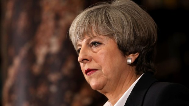 British Prime Minister Theresa May has come under pressure over cuts to police funding and numbers on her watch.
