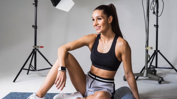 Bikini Body Training Company creator Kayla Itsines cracked a number of world records with more than 2200 of her fans.