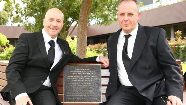 Memories: Track rider Steve Nicholson and foreman Robin Trevor-Jones pose next to the plaque installed as a tribute to Red Cadeaux on Black Caviar Lightning Day at Flemington.