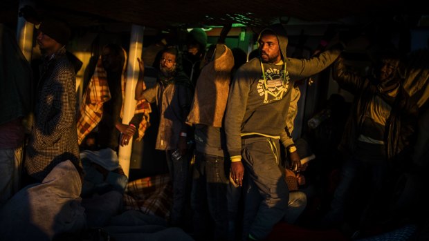 Sub-Saharan refugees and migrants from different nationalities rest aboard the Spanish NGO Proactiva Open Arms vessel after being rescued off the Libyan coast last week.