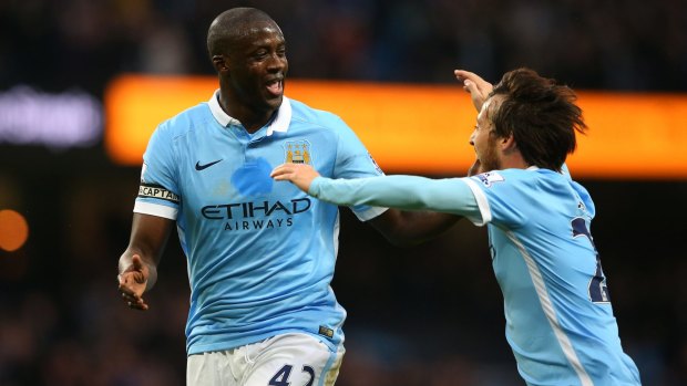 Yaya Toure of Manchester City (left) is reported to have been offered staggering sums to play in China.