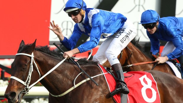 Mission accomplished: Hugh Bowman pilots Winx to victory in the George Main Stakes.
