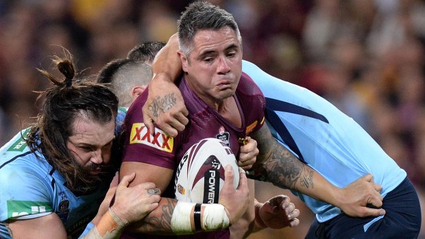 Corey Parker attempts to break through the defence during game three of the State of Origin series.
