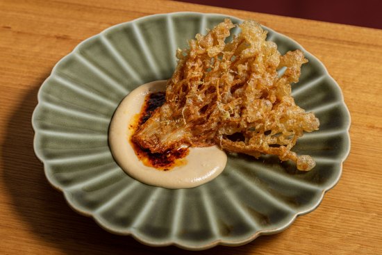 Tempura enoki mushroom with almond tarator and chilli oil.