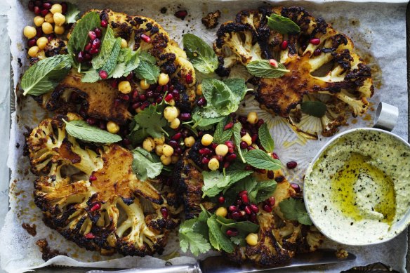 Thick cauliflower steaks slathered with a spicy harissa paste and roasted until caramelised.