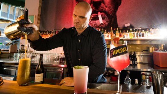 Rob Libecans mixes a drink at Melbourne's Fancy Free. 