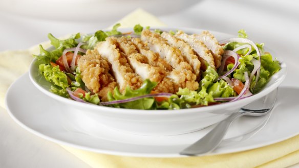 That chicken salad may not be as healthy as you think. Opt for grilled chicken over crispy or crumbed options, and be wary of croutons and creamy dressings. 
