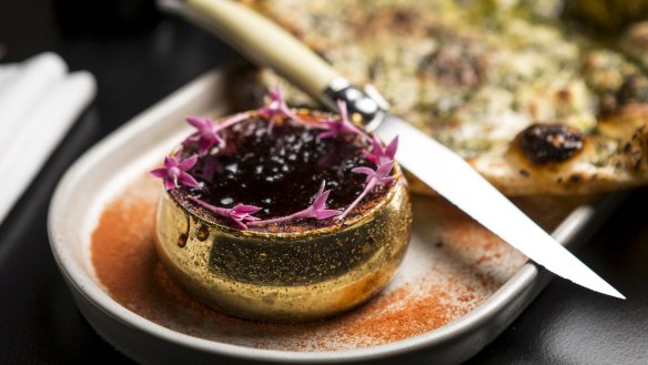 Butter chicken creme brulee  with garlic truffle naan.