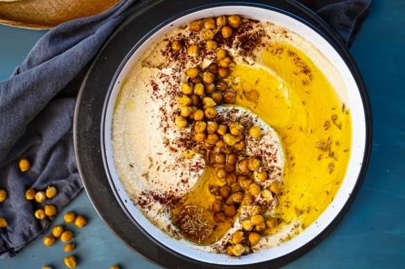 Swipe some flatbread through this preserved lemon hummus with crispy spicy chickpeas.