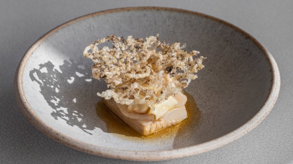 Go-to dish: Smoked pig jowl, fan shell razor clams, shiitake, sea cucumber crackling.