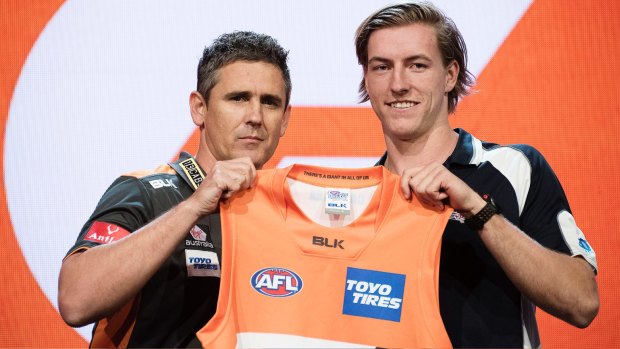Giants coach Leon Cameron with number-five pick Will Setterfield at last year's draft. 