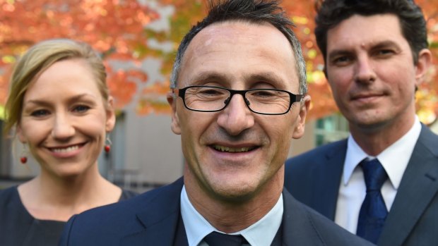 Greens leader Richard Di Natale (centre) has lost two of his senators to dual-citizenship confusion, Larissa Waters and Scott Ludlam. 