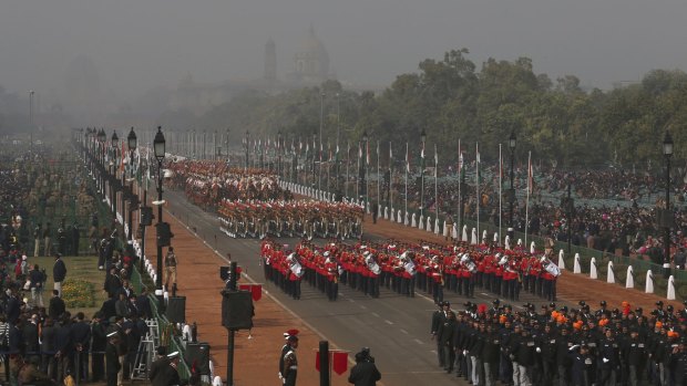 Soldiers march down Rajpath, a ceremonial boulevard that runs from Indian President's palace to war memorial India Gate, during a full dress rehearsal ahead of Republic Day parade in New Delhi, India.
