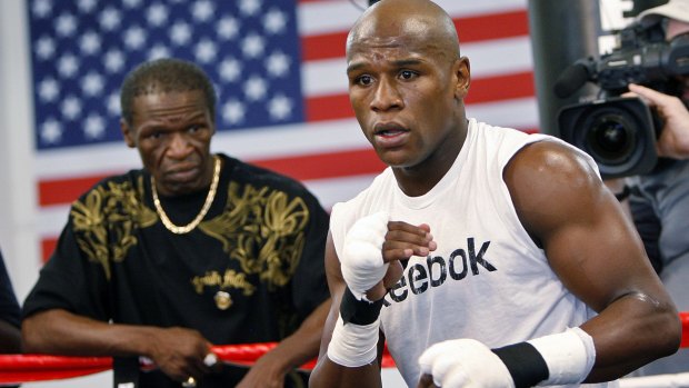 It's all about the money: Floyd Mayweather has a phalanx of admirers.
