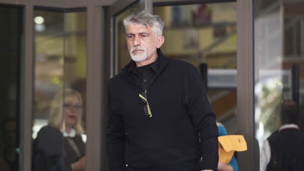 Slavoljub Vukotic, the father of slain teenager Masa Vukotic leaves Melbourne Magistrates Court.