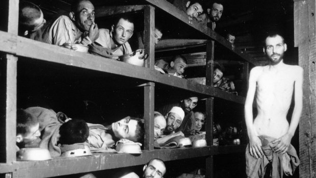 Inmates of the Buchenwald concentration camp inside their barrack, a few days after US troops liberated them at the end of World War II. 