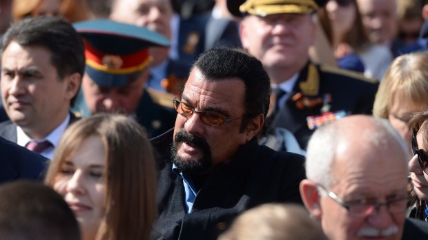 No kidding: Action star Steven Seagal attends a Russian military parade to mark the 70th anniversary of the end of World War II in Europe.