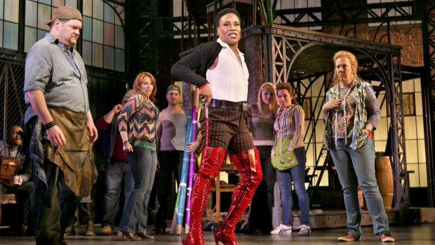 Billy Porter, centre, and Daniel Stewart Sherman, left, in the musical Kinky Boots at the Al Hirschfeld Theater in New York,  2013. 
