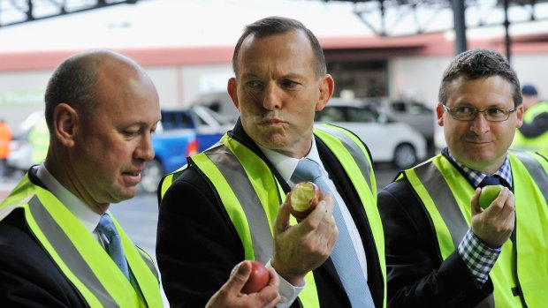 Awaydays to Adelaide for the cabinet and Tony Abbott – seen here at the produce market in Pooraka – fell down the news rankings after choppergate and the prospect of Sunday penalty rates being cut.