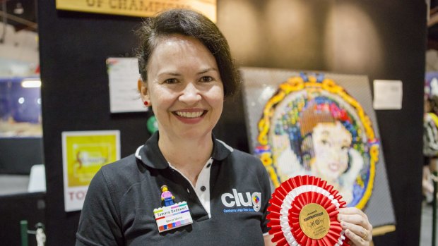 The Champion of Champions of The Royal Canberra show Craft Expo, Tamara Dadswell with "Mirror Mirror" her lenticular mosaic lego piece.