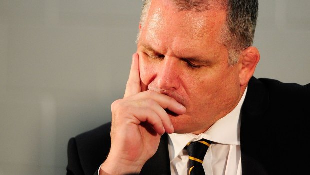 Tough night: Ewen McKenzie after he anounced his resignation as Wallabies coach.