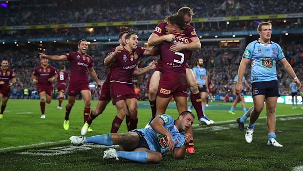 Same again: Dane Gagai crosses to give the Maroons an unlikely victory in game two.