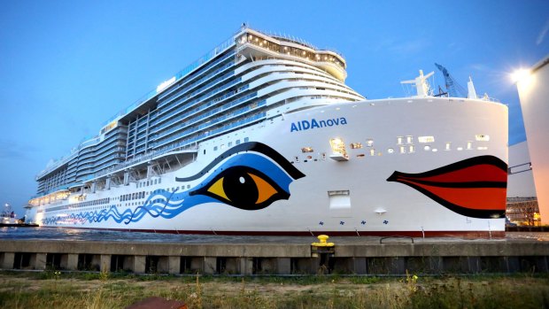 AIDAnova leaves dry dock at the Meqer-Werft shipyards in Papenburg, northern Germany.