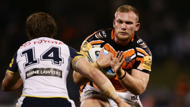 Matthew Lodge in action for Wests Tigers against the Cowboys this year.