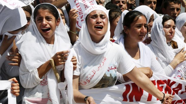 Yazidi Kurdish women protest against Islamic State in Dohuk, Iraq, last year. 