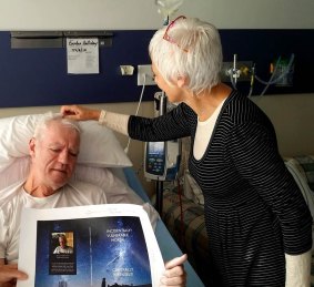 Brendan and Glendah in Beechworth Hospital with the cover of his book. 