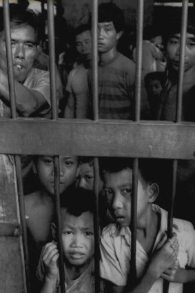 Laotian refugees who fled communist rule await processing in Nong Khai province, Thailand, in January 1978. 