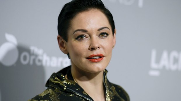 FILE - In this April 15, 2015 file photo, Rose McGowan arrives at the LA Premiere Of "DIOR & I" held at the Leo S. Bing Theatre in Los Angeles. McGowan emerged from a brief suspension on Twitter on Thursday, Oct. 12, 2017, to offer her most pointed accusation that she was sexually abused by film mogul Harvey Weinstein. Weinstein's representative says the producer denies he engaged in "any non-consensual contact." (Photo by Richard Shotwell/Invision/AP, File)