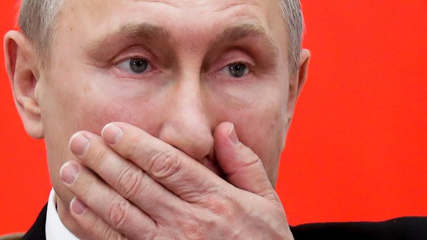 Russian President Vladimir Putin bore a grudge against Hillary Clinton, officials say.