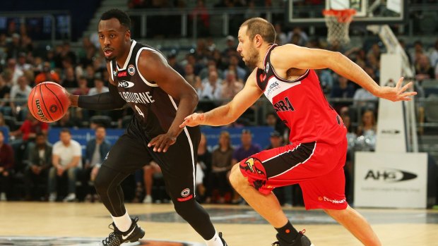 Melbourne United's Cedric Jackson takes the ball against the Illawarra Hawks on October 16.