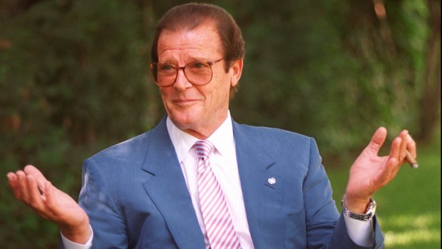 In the 1996 film <i>The Quest</i>, Roger Moore displays the dapper, quizzical charm that brought him fame and success throughout the latter 20th century.