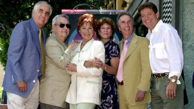 From left: Garry Marshall, Tom Bosley, Marion Ross, Erin Moran, Henry Winkler, and Anson Williams of <i>Happy Days</i> pose together in 2001.