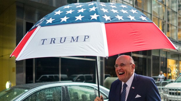 Rudy Giuliani, pictured with a Trump umbrella.