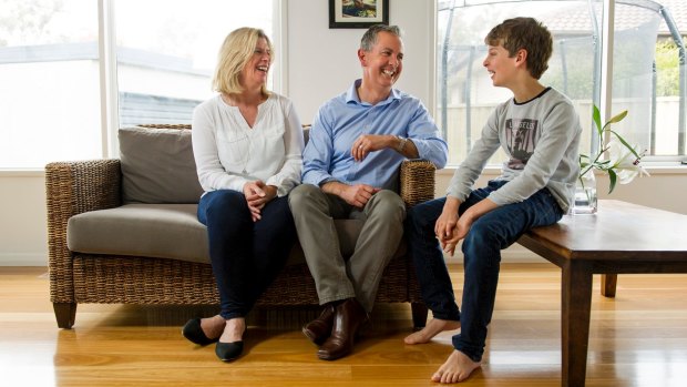 Liberal leader Jeremy Hanson with his wife Fleur and son Robbie, 10, in their Holder home. 