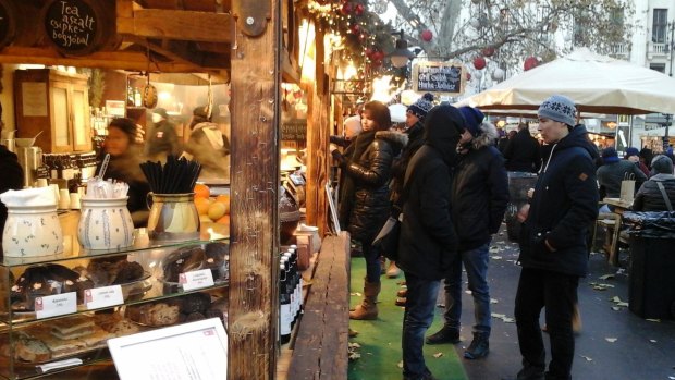At Christmas and New Year markets in Budapest people have different views on immigration.