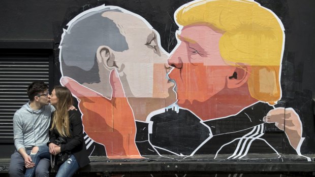 Election-era street art in Lithuania purports to show the extent of the special relationship between Vladimir Putin and Donald Trump.